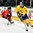 GRAND FORKS, NORTH DAKOTA - APRIL 23: Sweden's Tim Soderlund #23 skates with the puck while Canada's David Quenneville #18 chases him down during semifinal round action at the 2016 IIHF Ice Hockey U18 World Championship. (Photo by Minas Panagiotakis/HHOF-IIHF Images)

